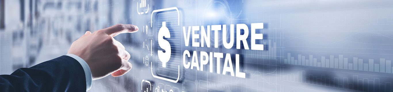 dłoń wskazująca napis Venture Capital